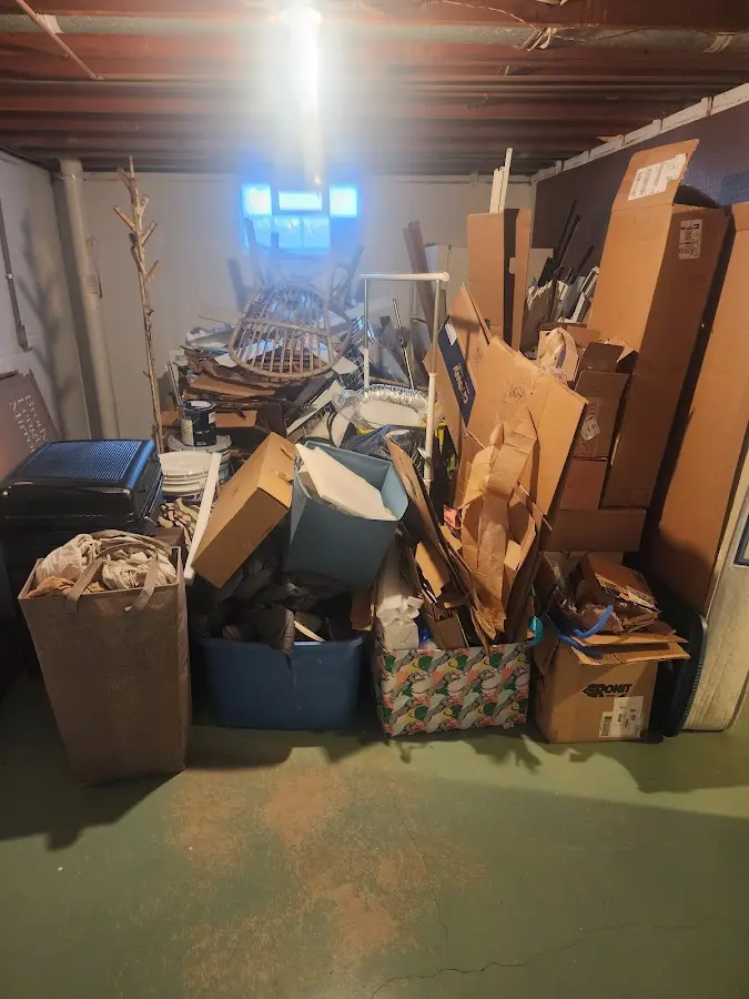 Roll-off dumpster container at job site for Yard Waste Dumpster Rental in Cresco